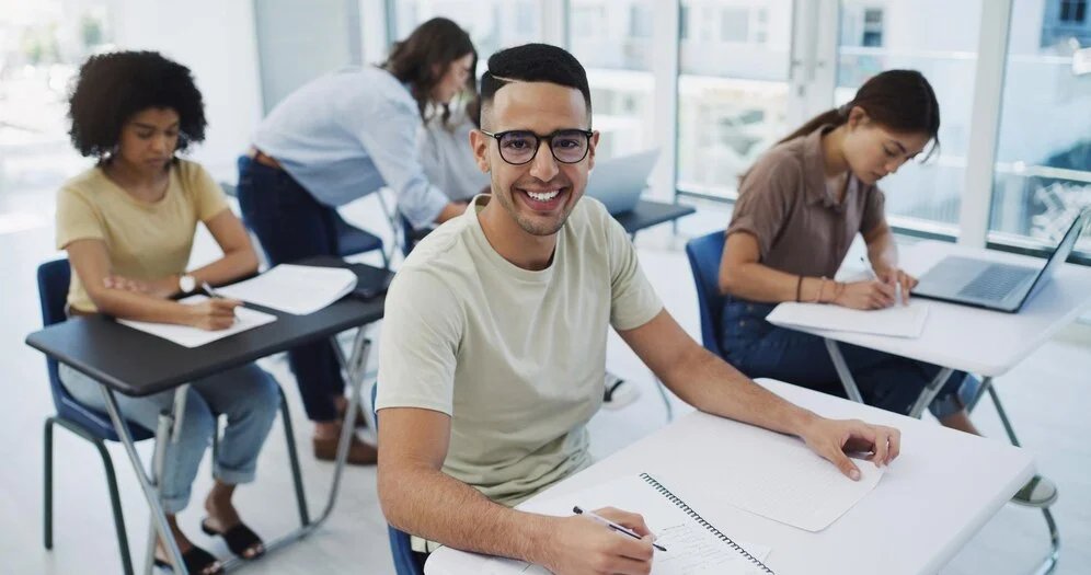 like rowing upstream advance is drop back portrait happy young student among his classmates classroom university 590464 49917